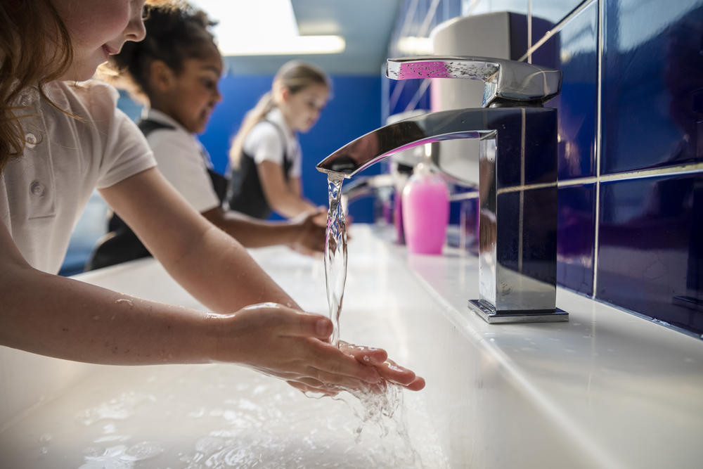School children washing hands